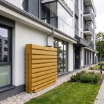 Ścienny zbiornik na deszczówkę wodę 1000 L płaski modułowy naziemny Rainwater Wall HARVES żółty